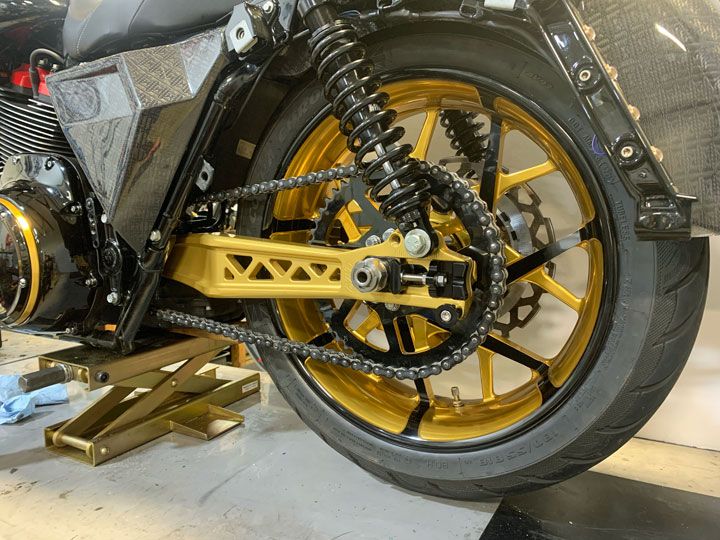 HHI Hawg Halters Dominator Gold Billet Swingarm fits 2009-2024 Harley Touring